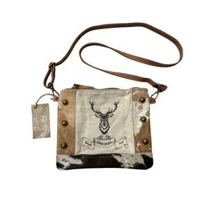 Clea Ray Leather & cow hide